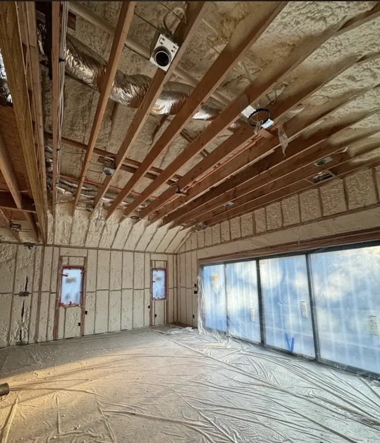 Interior walls and ceiling insulated with spray foam during new construction in Ranchettes